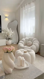 Fauteuil lounge en tissu bouclé